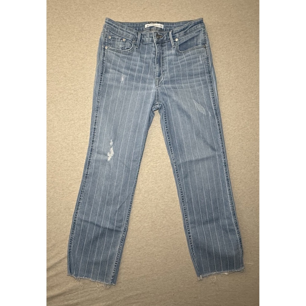 44 sustainable denim. light wash denim. white stripes. size 29